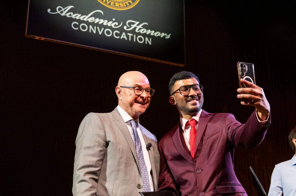 Abhishek Sagar Sanda with the president of Northeastern University at the Academic Honors Convocation, 2026